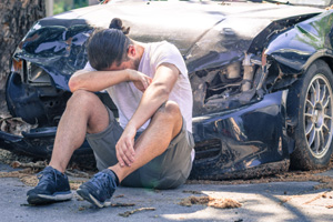 desperate man after car crash